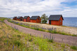 Fischerhütten am Geröllfeld Neptuni Åkrar an der Ostseeküste auf der Insel Öland in Schweden