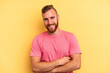 © Asier - Young caucasian man isolated on yellow background laughing and having fun.