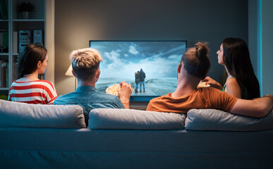 Wall Mural - Friends watching movies together at home