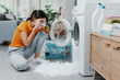 © StockPhotoPro - Broken washing machine at home