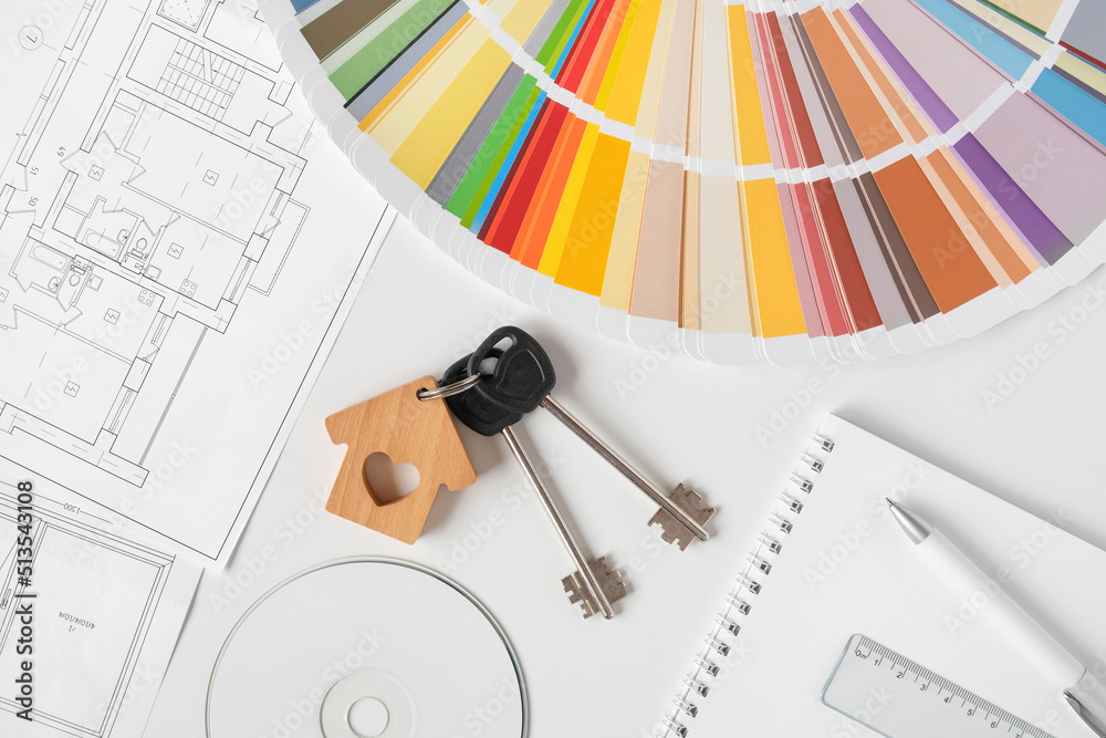Hands choosing Colors of Interior Design from the Color Guide ...