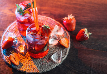 Wall Mural - two glasses of strawberry mojito, refreshing summer cocktail