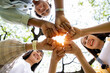 Close up, hands Teamwork group of multi racial people meeting join hands at park. Diversity people hands join empower partnership teams connect volunteer community. Diverse multiethnic Partners team