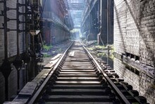 Beautiful Shot Of A Railroad With Sunrays Coming From Above
