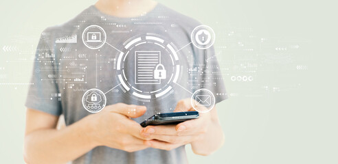 Wall Mural - Data protection concept with young man using a smartphone