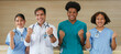 © gumpapa - happy smiling confident group of young and intern medical students and doctor. Healthcare and medical education.