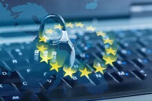 Digital Service Act Concept: Lock On Computer Keyboard And Europe Flag