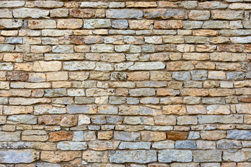 slate, stone and brick wall texture background of the building or fence