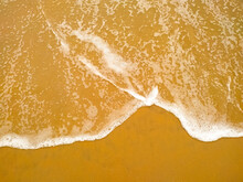 Beautiful Waves Crashing On Sandy Beach