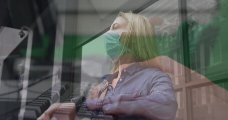 Poster - Animation of hands using computer over caucasian woman with face mask