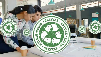 Poster - Animation of recycling icons over diverse female and male coworkers in office