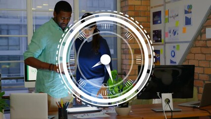 Sticker - Animation of clock moving over diverse female and male coworkers in office