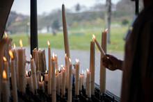 Lighting Church Candles 
