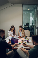 Wall Mural - Group of business people having a meeting in the office