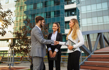 Sticker - Group of business man and woman team at office shaking hands outdoors