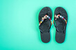 flip flops on a blue background. Beach slippers close-up. Upcoming vacation. Horizontal image