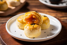 Chinese Dessert Cheese Egg Yolk Puff With Clipping Path On Table
