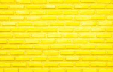 Sticker - Brick wall painted with yellow paint pastel bright tone texture background. Brickwork and stonework flooring interior.