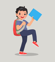 Wall Mural - cute little boy student with backpack holding book and pen walking feeling excited to be back to school