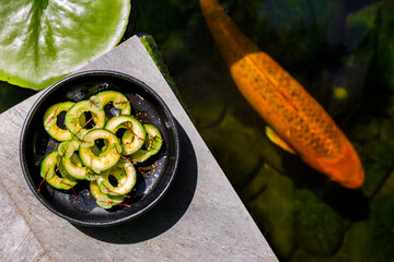 Wall Mural - Fried pitted avocado with sorrel leaves