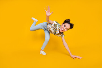 Sticker - Photo of lovely funky woman wear print t-shirt dancing waving arm isolated yellow color background