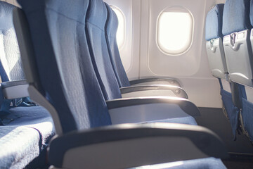 Empty seat on airplane while covid-19 outbreak destroy travel and airline business