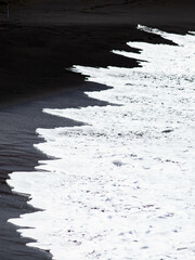 Wall Mural - abstract wall art of black sand and sea waves