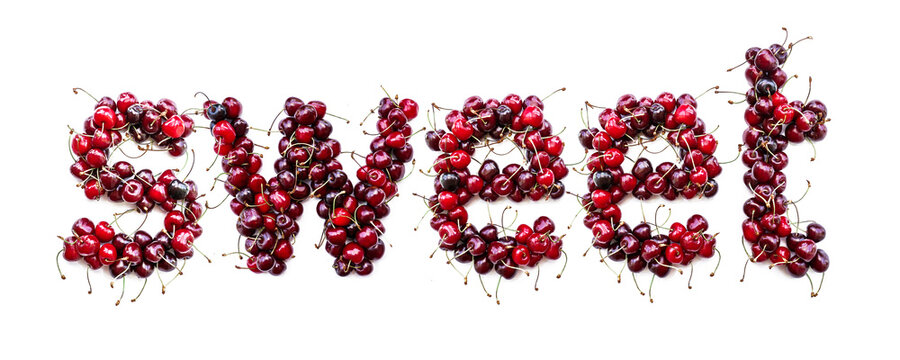 Sweet - a sweet inscription from the berries of ripe cherries in English. Isolate on a white background, ready-made inscription for design and layout. Great gift and tasty treat