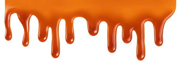 Wall Mural - Dripping caramel drops of sweet sauce isolated on white background. Melted caramel sauce