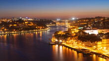 Skyline Of The Historic City Of Porto At Night With The Bridge Ponte De Arrabida In The Background, Oporto, Portugal