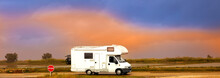 Motorhome At Sunset On The Road