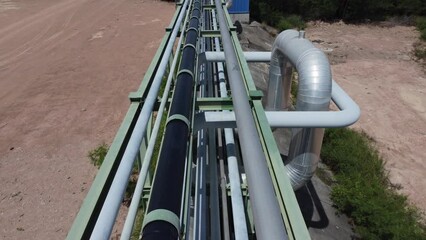 Wall Mural - Oil pipeline and gas pipeline stretched transfer during oil refinery and chemical industrial plant, Aerial view