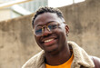 © Daniel - Headshot portrait of attractive, happy african american male gen z college student looking at camera smiling.