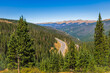 View of mountain road through Rocky Mountain National Park, Colorado, USA, from continental divide at Berthoud Pass in autumn