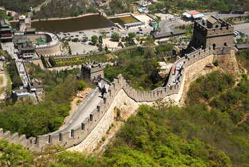 Wall Mural - China, June 6, 2014. Tourists visit one of the world heritage wonders of the Great Wall of China or Tiongkok which has a total length of 21,196 kilometers.