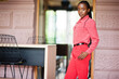 Pretty braids business african american lady bright bossy person friendly wear office red shirt and trousers.