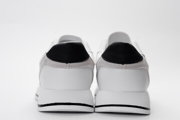 White shoes on gray and white background