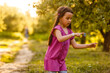 © Angelov - Sweet child child trying to catch soap bubble