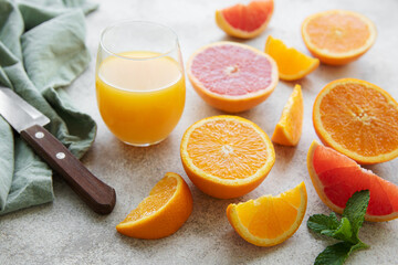 Wall Mural - Glasses of juice and citrus fruits