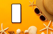 Summer Background With Blank Screen Phone And Beach Accessories - Sunglasses, Straw Hat On Vibrant Orange Background Top View With Copy Space