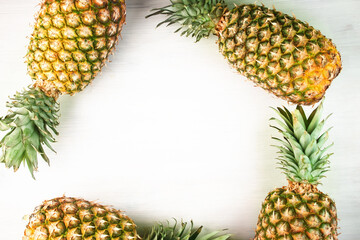 pineapple fruit background,juicy sweet ripe whole ananas on white,healthy food