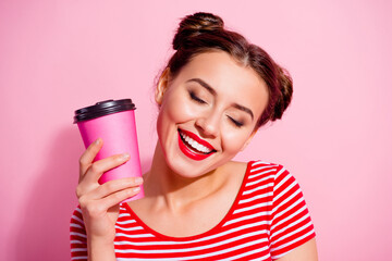 Wall Mural - Photo of young lovely girl relaxing drinking yummy hot chocolate during walk isolated on pink color background