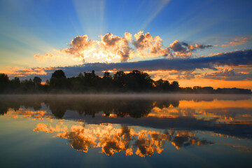 Wall Mural - sunrise and reflection in river