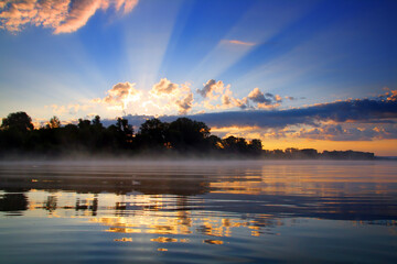 Wall Mural - sunrise and reflection in river