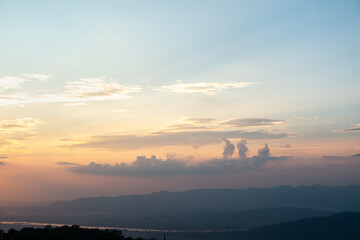 Wall Mural - colorful sunset and sunrise with clouds. blue and orange color of nature