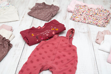 Wall Mural - Red baby clothes for girls