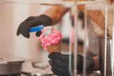 Fototapeta Tulipany - Process of making ice cream. Professional ice cream dessert making in cafeteria. Ice cream equipment.