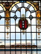 Historic Canal House Stained Glass Window Detail with the Amsterdam Coat of Arms in Amsterdam, Netherlands