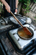 © Niko_Dali - Cooking in the field during the war, field kitchen of the Ukrainian military.