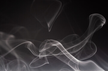 Wall Mural - Abstract smoke on a dark background . Isolated .